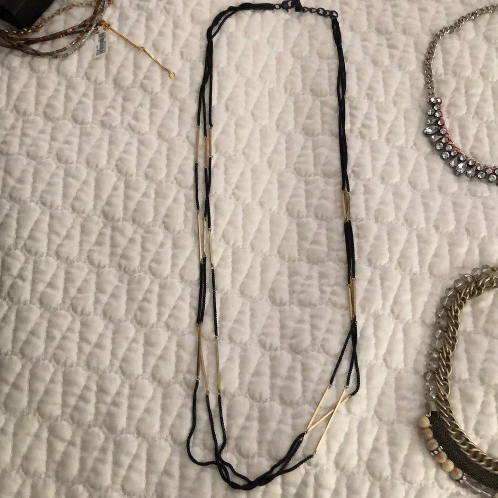 Black and gold triple strand long necklace